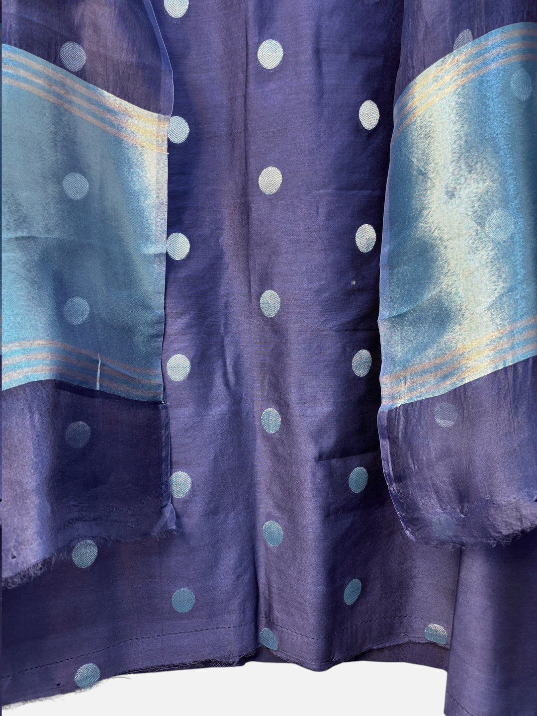 Design by Pakiza brown pure silk Maheshwari fabric with gold polka zari weaving and elegant tissue pallu detailing.