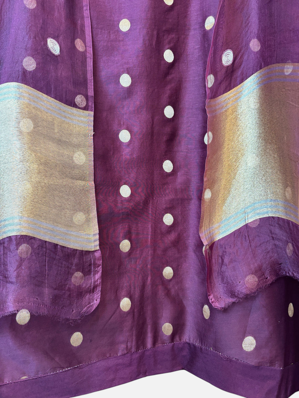 Design by Pakiza wine pure silk Maheshwari fabric with gold polka zari weaving and elegant tissue pallu detailing