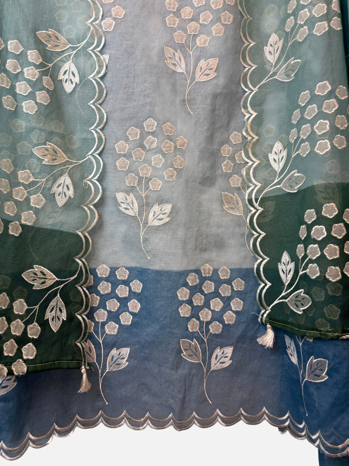 Design by Pakiza blue and green ombre mul chanderi fabric with intricate white floral applique and scalloped edges