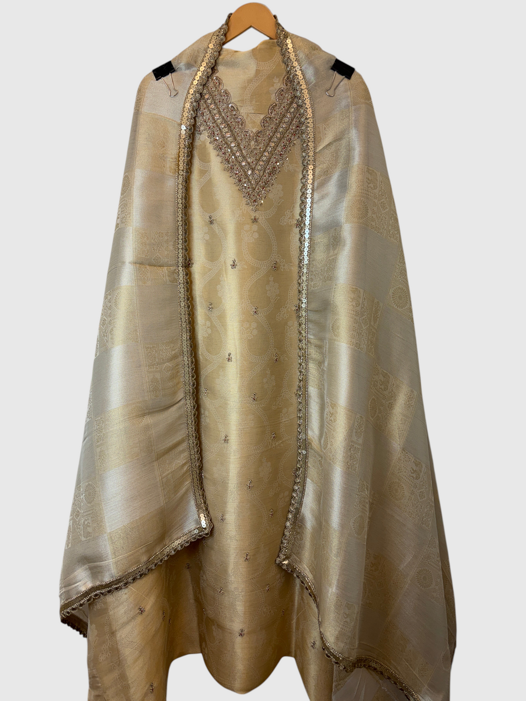 Design by Pakiza ivory gold pure tissue 3-piece suit with intricate dabka, sequin, and beadwork on the neckline.