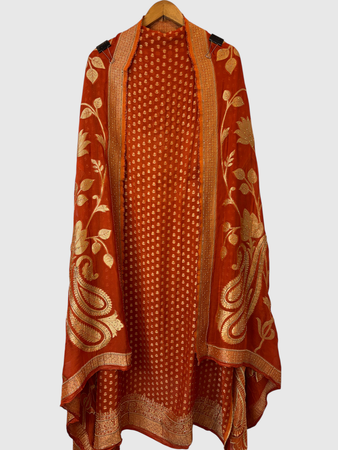 Design by Pakiza orange khadi georgette Banarasi suit set with gold woven booties, beadwork, and floral dupatta