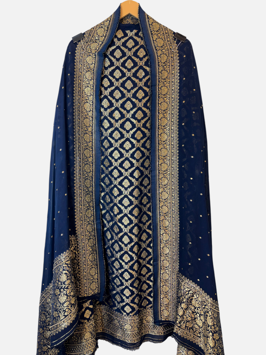 Design by Pakiza blue Khadi Georgette 3-piece suit with gold Banarasi jaal, stone embellishments, and silk bottom.