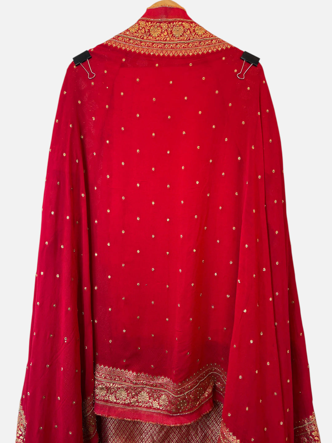 Design by Pakiza red georgette dupatta with gold Banarasi woven border, stone embellishments, and scattered booties.