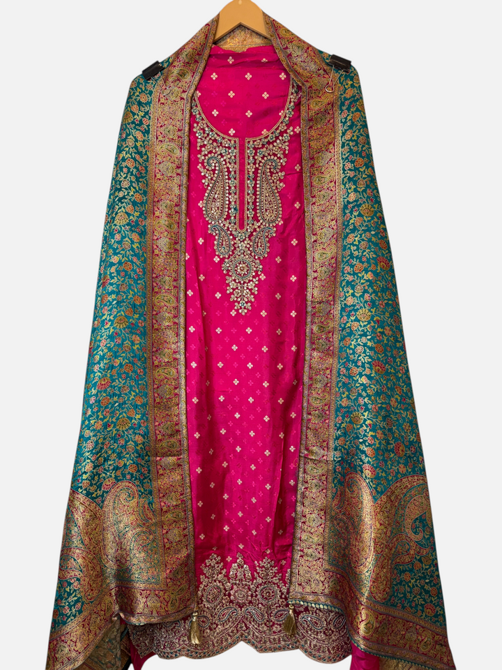 Design by Pakiza pink silk Banarasi ensemble with intricate zari, sequin, and stone embroidery on a woven shirt.