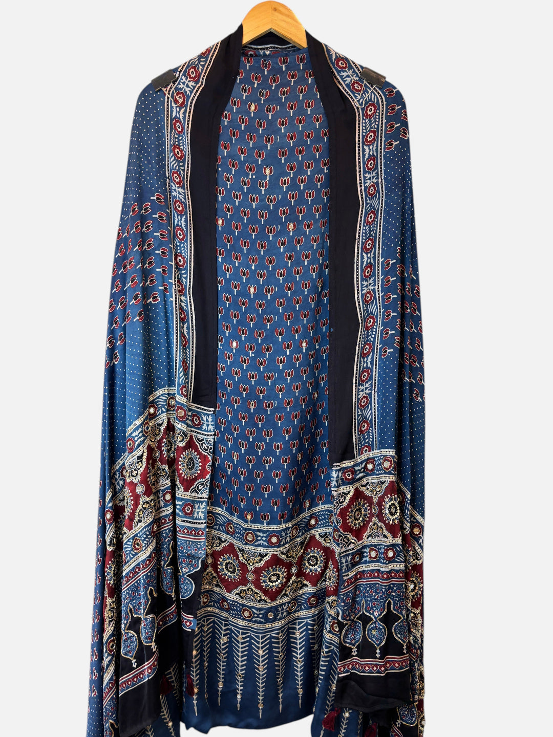 Design by Pakiza blue modal suit set featuring traditional Ajrakh print, intricate mirror work, and lotus handwork.
