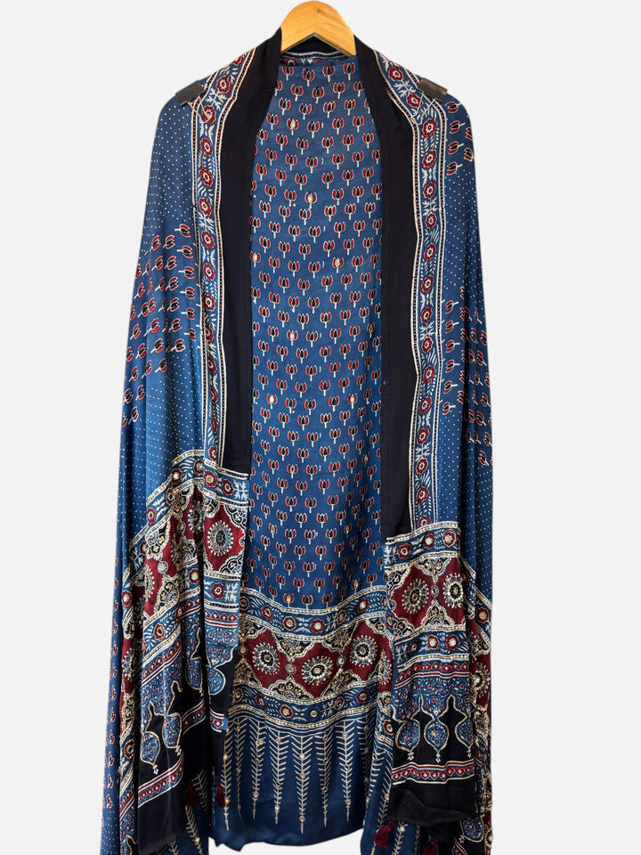 Design by Pakiza blue modal suit set featuring traditional Ajrakh print, intricate mirror work, and lotus handwork.