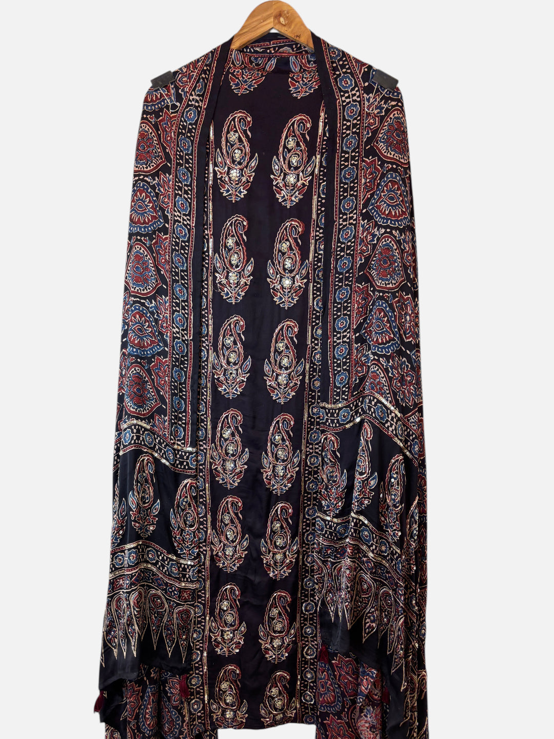 Design by Pakiza black modal silk ensemble with traditional Ajrakh hand block print, paisley motifs, and zardozi work.