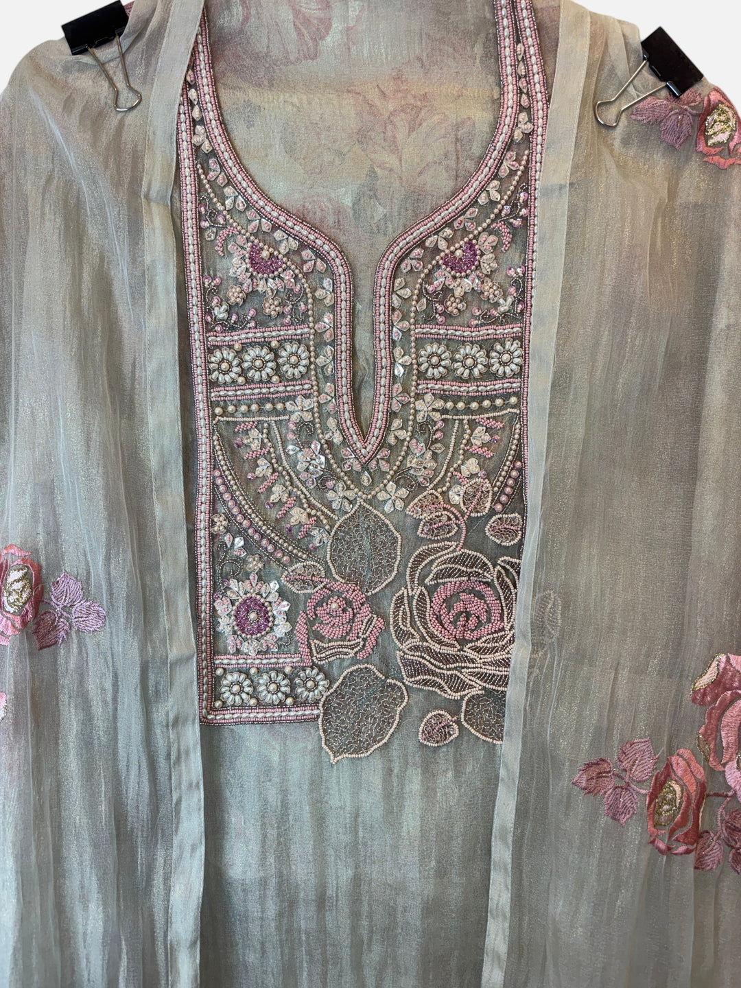 Design by Pakiza crush tissue shirt with intricate pearl, bead, and zari floral embroidery on the neckline