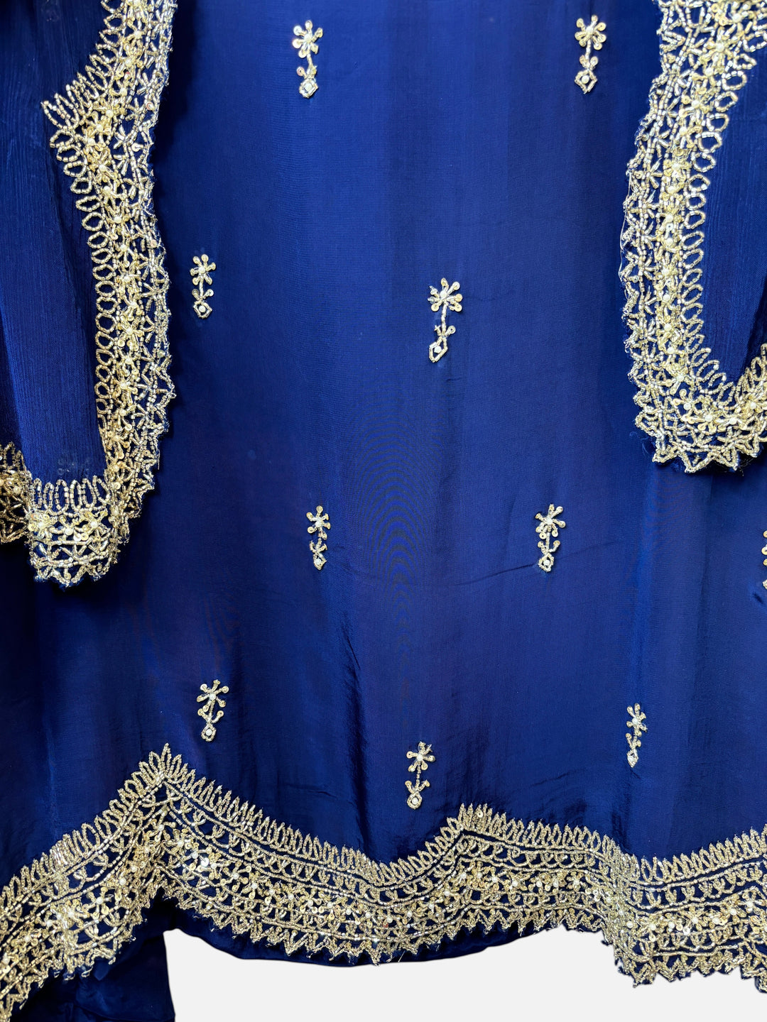 Design by Pakiza royal blue crepe shirt with intricate gold cutdana, sequin, and pearl embroidery and cutwork border
