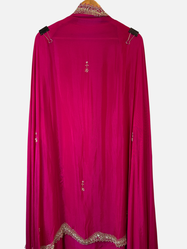 Design by Pakiza magenta pure crepe unstitched shirt with intricate cutdana, sequin, and pearl embellishments.