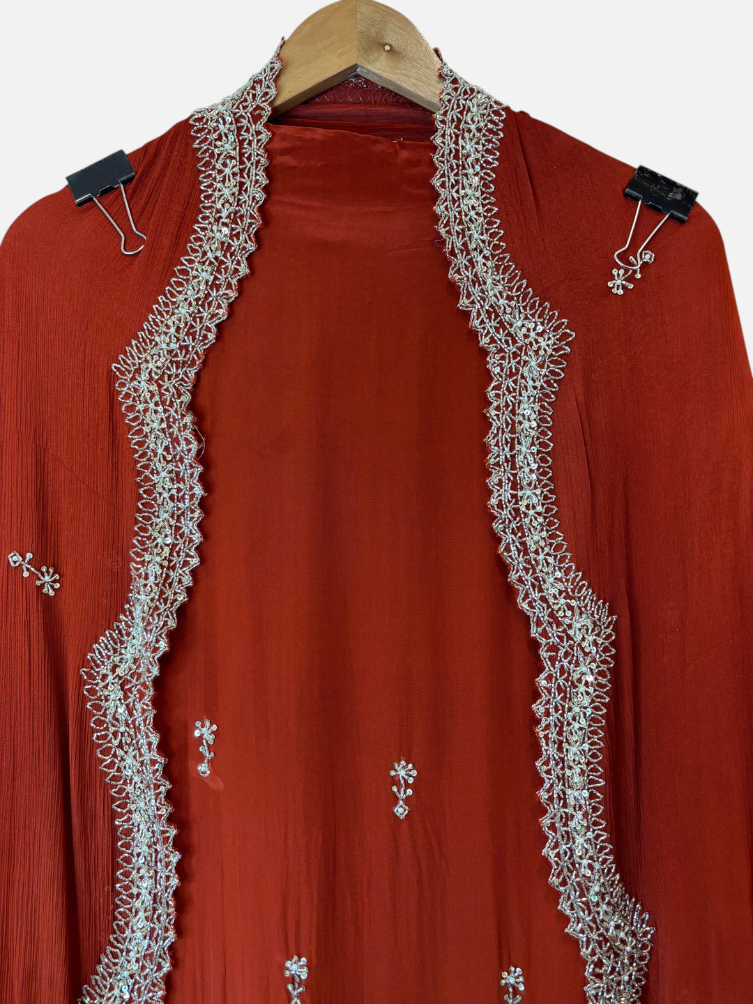 Design by Pakiza rust red pure crepe shirt with intricate silver cutdana, sequin, and pearl embroidery detailing