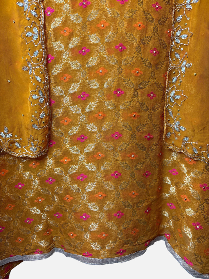 Design by Pakiza yellow khadi georgette Banarasi shirt with intricate dabka, sequin, and beadwork embellishments.