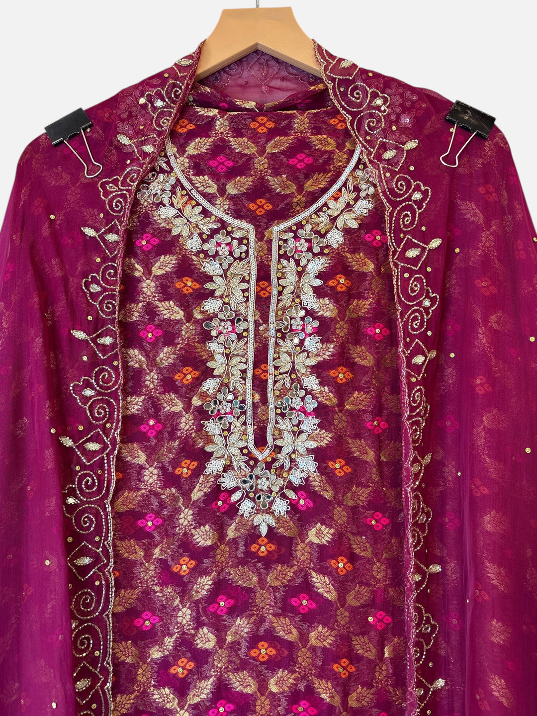 Design by Pakiza wine khadi georgette Banarasi shirt with intricate dabka, sequin, and mirror embellished neckline.
