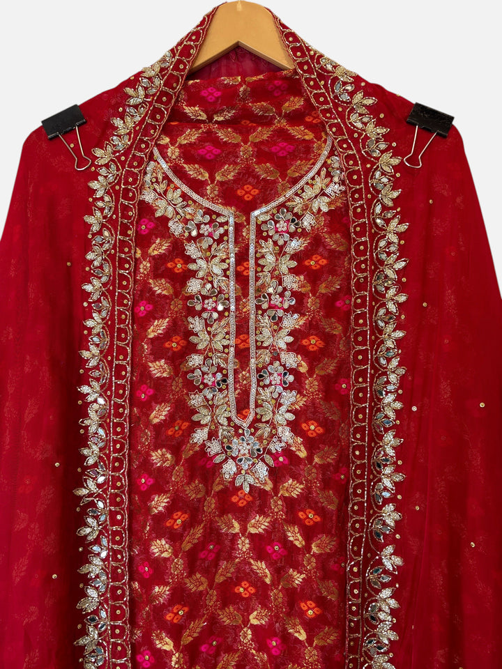 Design by Pakiza red khadi georgette Banarasi shirt with intricate dabka, sequin, mirror, and bead handwork embroidery.