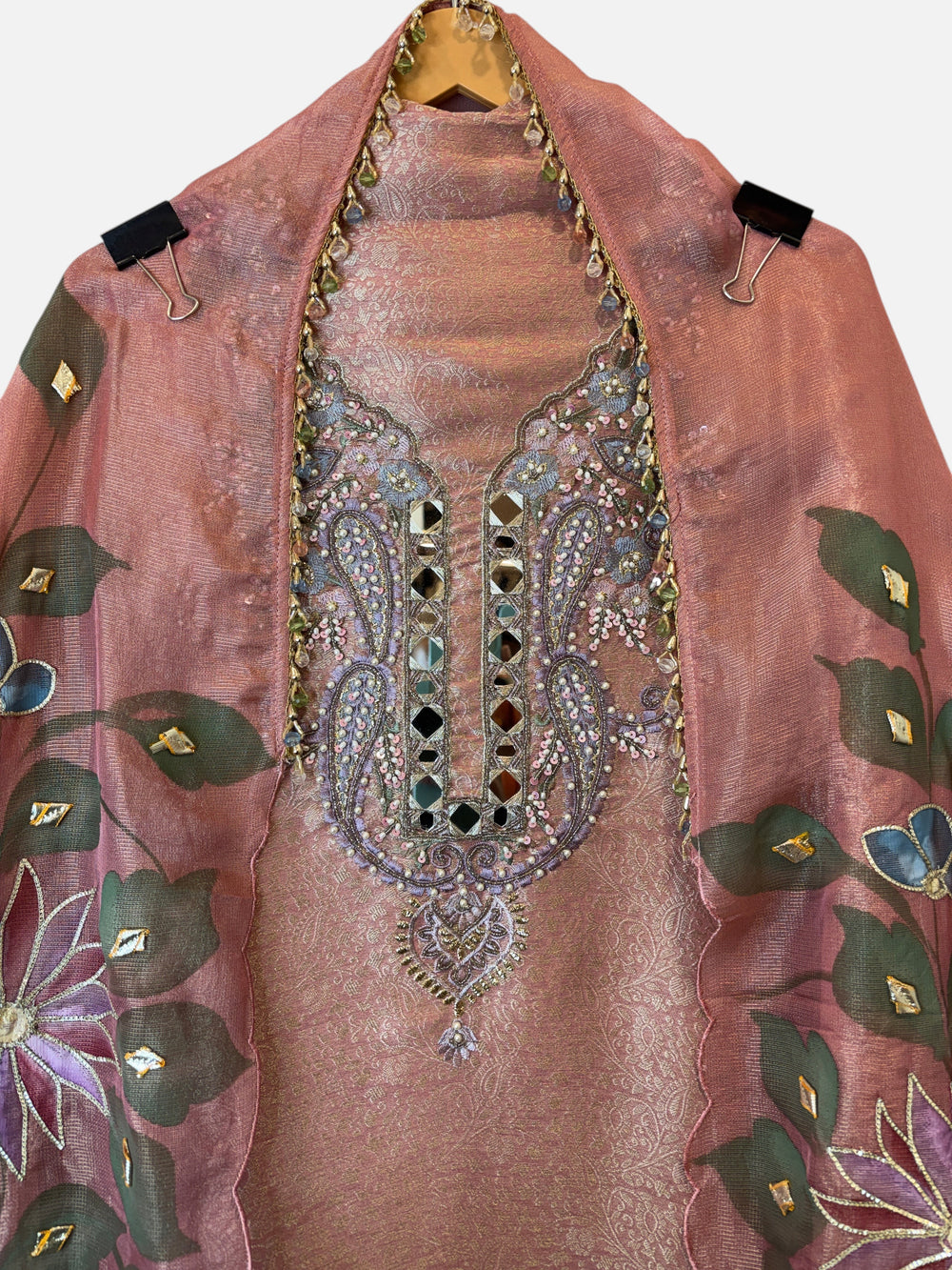 Design by Pakiza peach tissue brocade ensemble with hand-painted dupatta, mirror work, and intricate bead embroidery.