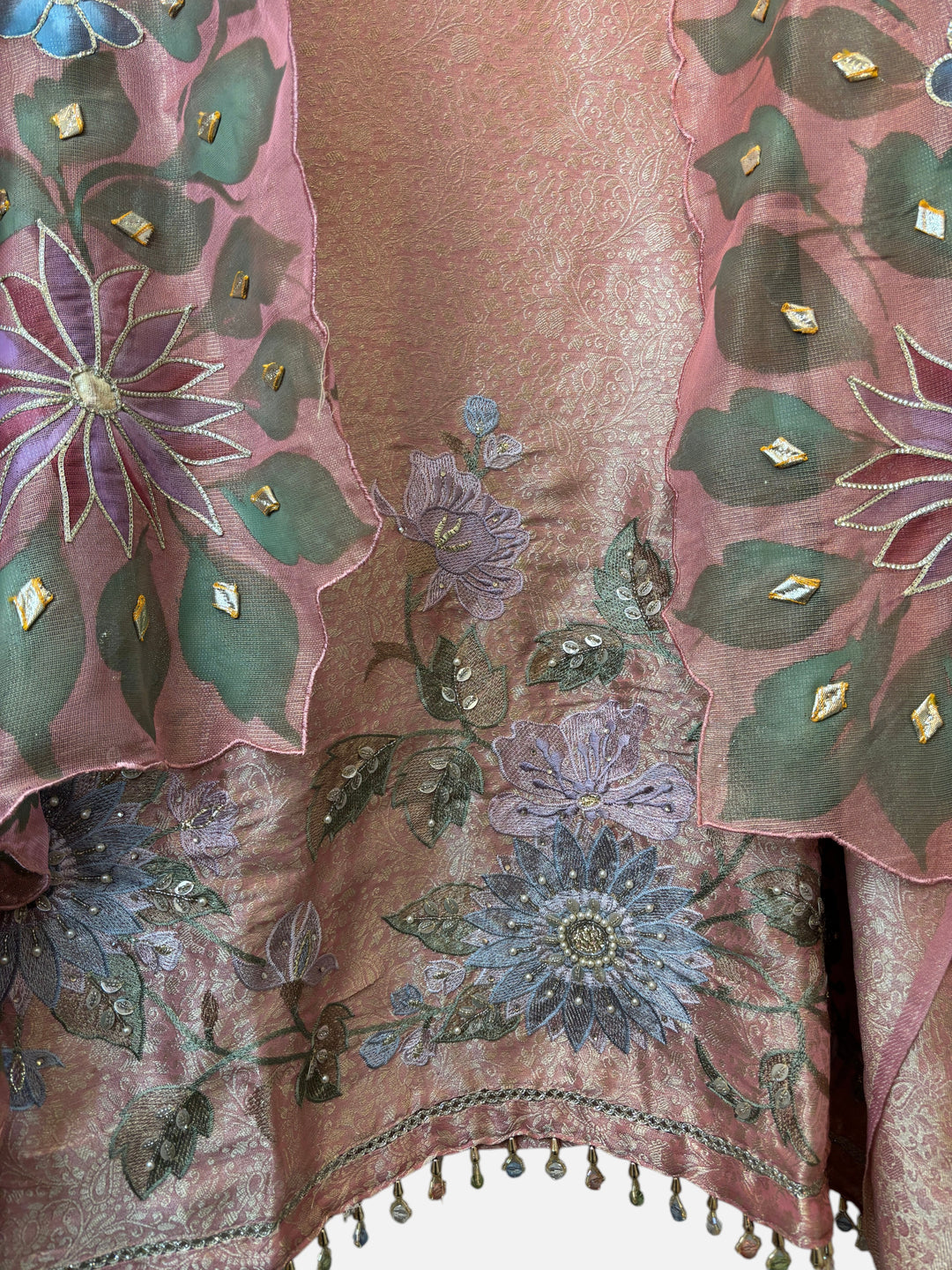 Design by Pakiza peach tissue brocade ensemble with hand-painted floral dupatta and intricate bead and mirror work.