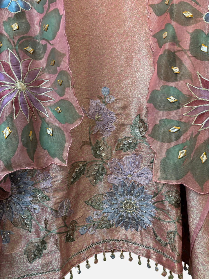 Design by Pakiza peach tissue brocade ensemble with hand-painted floral dupatta and intricate bead and mirror work.