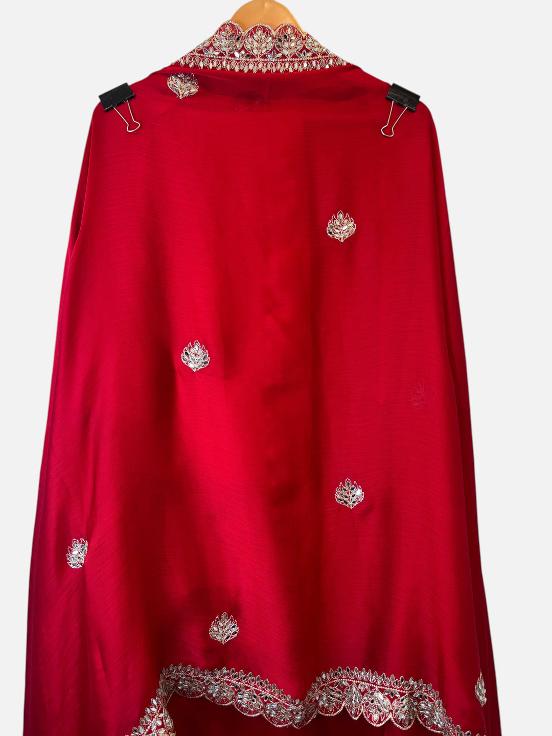 Design by Pakiza red chinon organza dupatta with silver zari work, mirror embellishments, and scalloped edges.