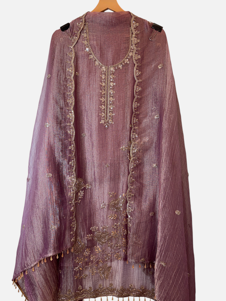 Design by Pakiza Ameera crush tissue ensemble with intricate zari, sequin embellishments, and tassel detailing.
