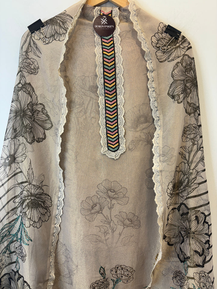 Raniya – Printed Tissue Suit with Embroidery Highlights