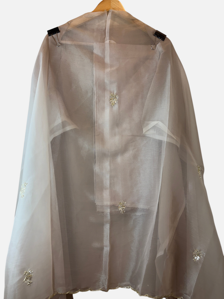 Design by Pakiza Ameera tissue fabric dupatta with delicate zari and pearl booties and scalloped cutdana edges