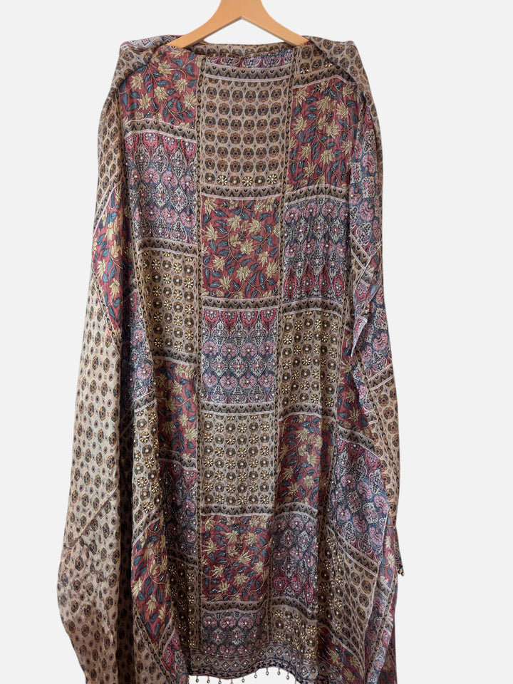 Design by Pakiza Myra digital print shirt with intricate pearl and cutdana beadwork and tassel detailing