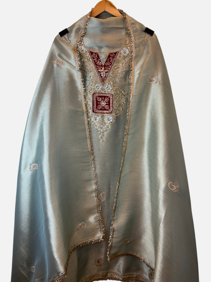Design by Pakiza unstitched giraffe tissue ensemble with intricate pearl, sequin, and dabka handwork on the neckline.