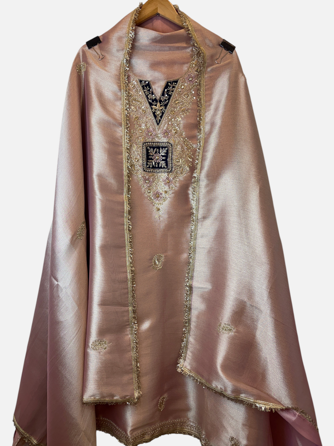 Design by Pakiza unstitched 3-piece ensemble in giraffe tissue with pearl, sequin, and dabka handwork on the neckline.