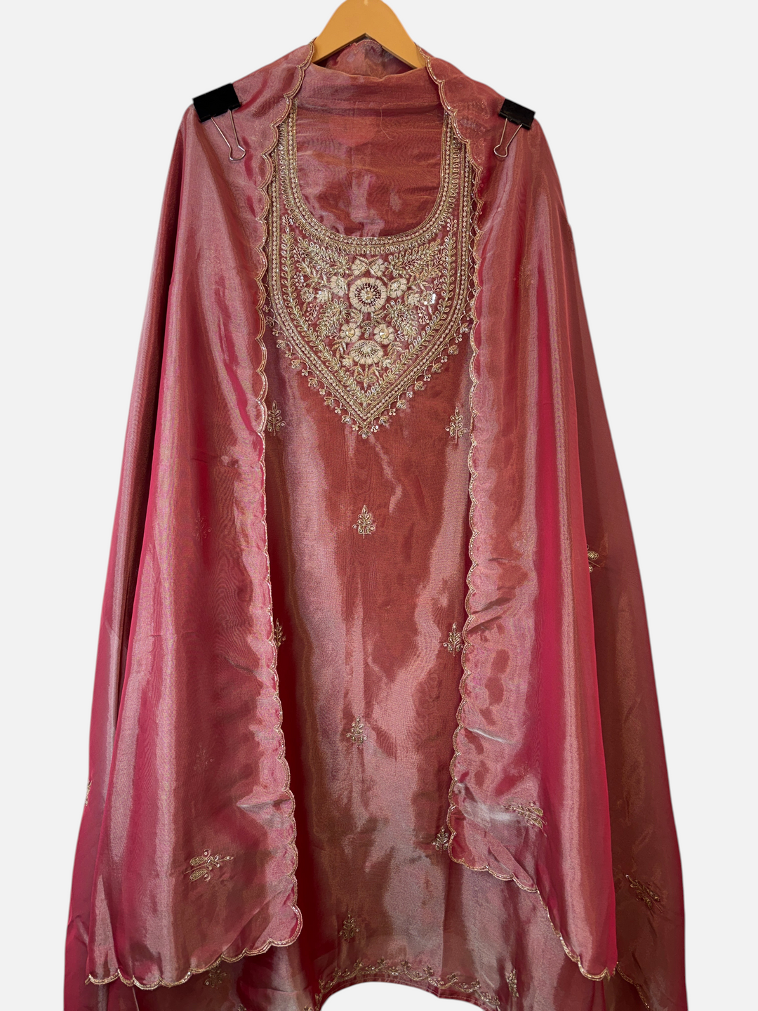 Design by Pakiza dusty rose Kanjivaram ensemble with intricate zari, dabka, and cutdana handwork on the neckline
