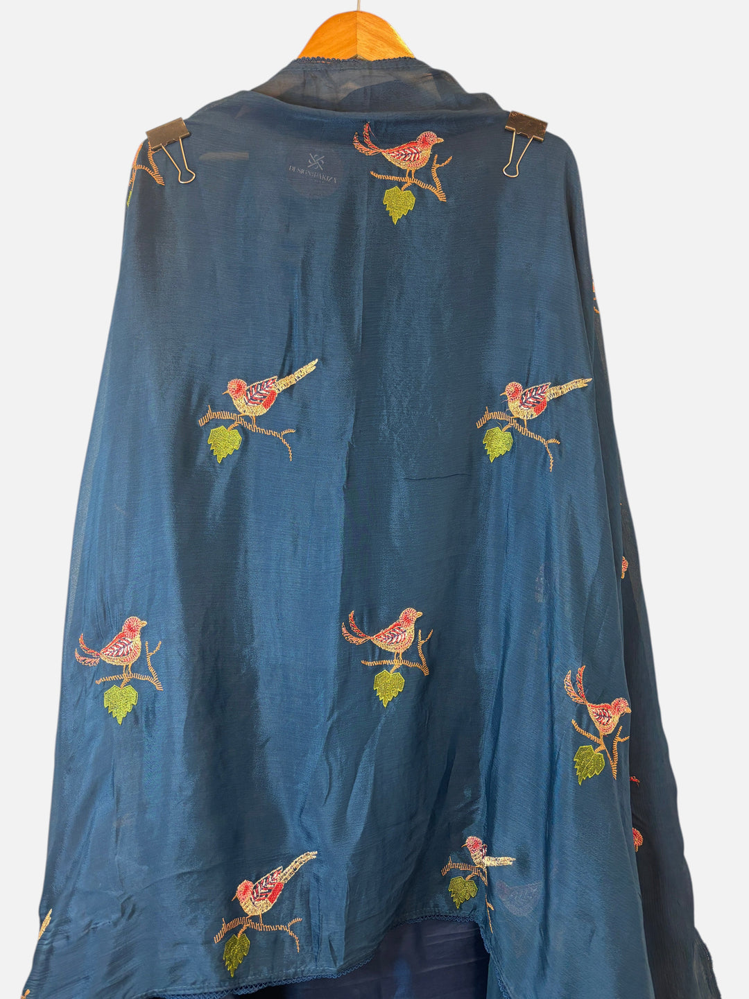 Design by Pakiza teal blue chinon dupatta with intricate bird embroidery, appliqué, and dabka work.
