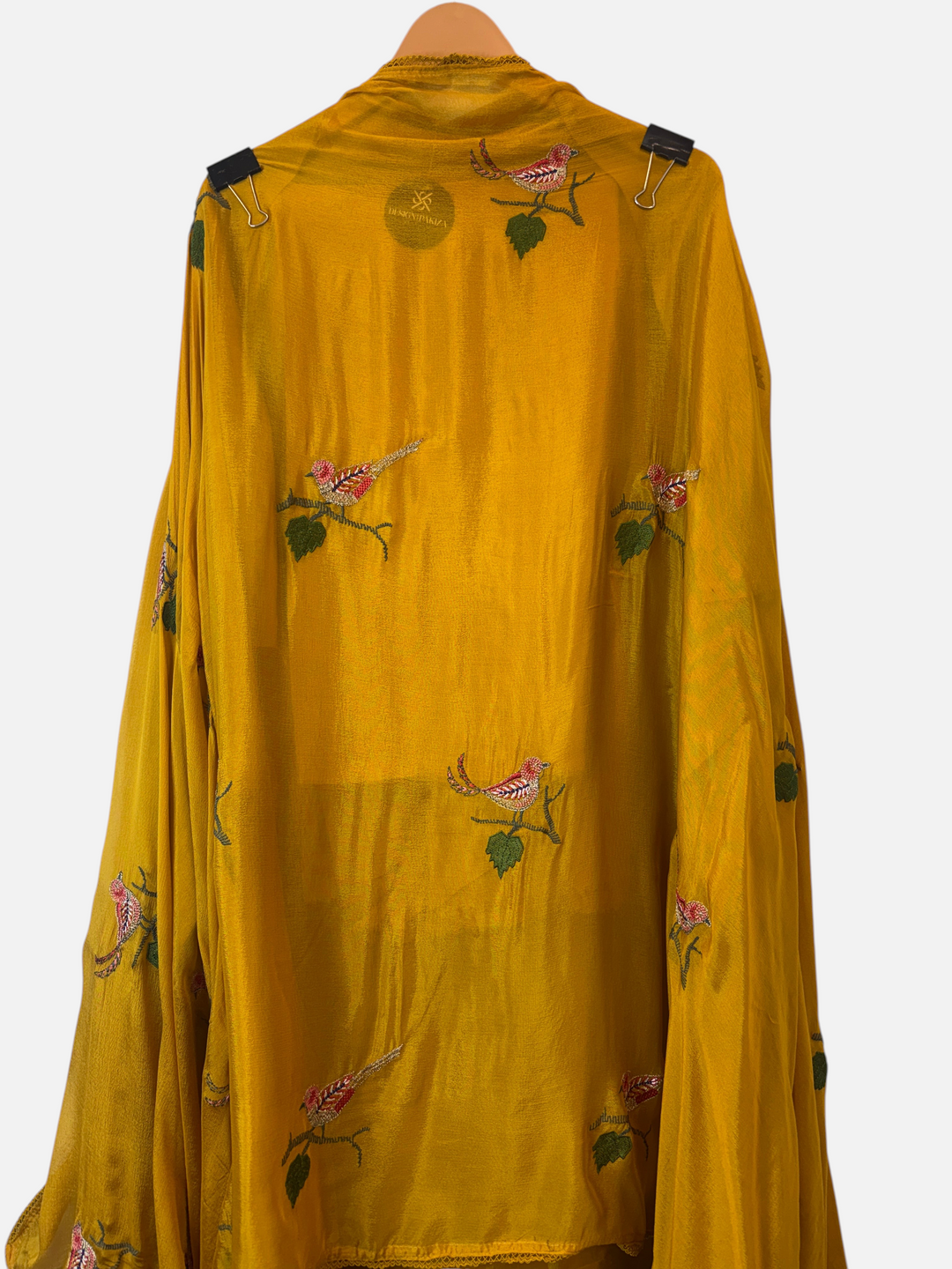 Design by Pakiza mustard yellow silk fabric with intricate bird appliqué and dabka embroidery for a 3-piece suit set