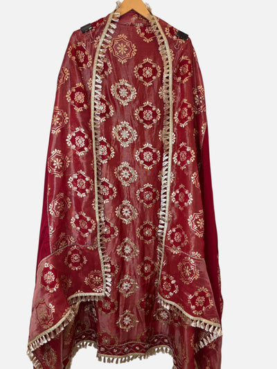 Design by Pakiza red tissue jacquard dupatta with intricate gold floral patterns and decorative lace trim edges