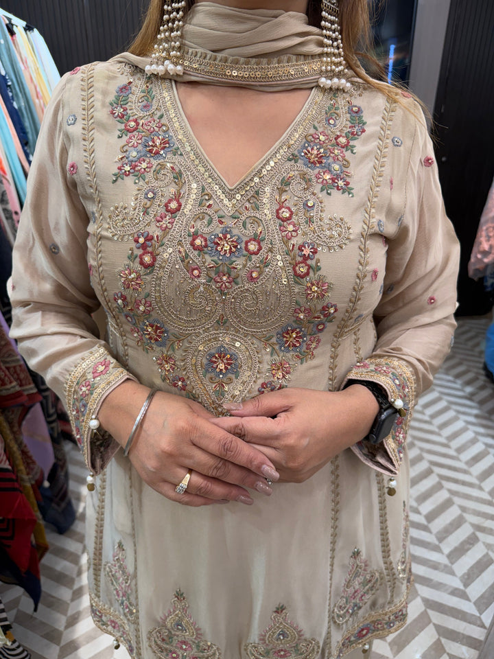 Zareen – Champagne Beige Chinon Embroidered Peplum Suit