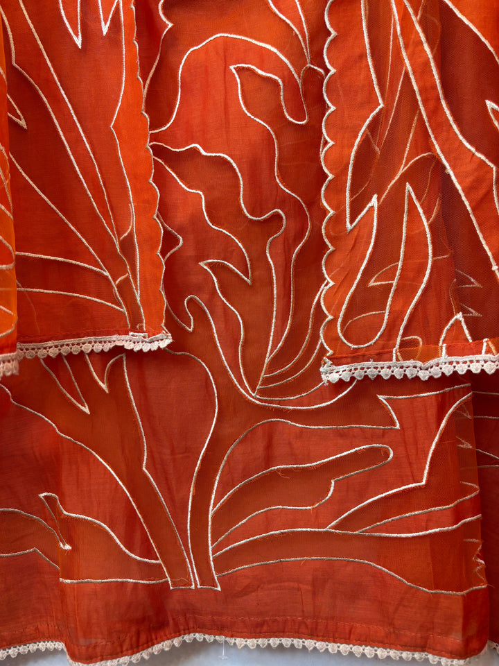 Applira – Orange Mul Cotton Net Appliqué Suit