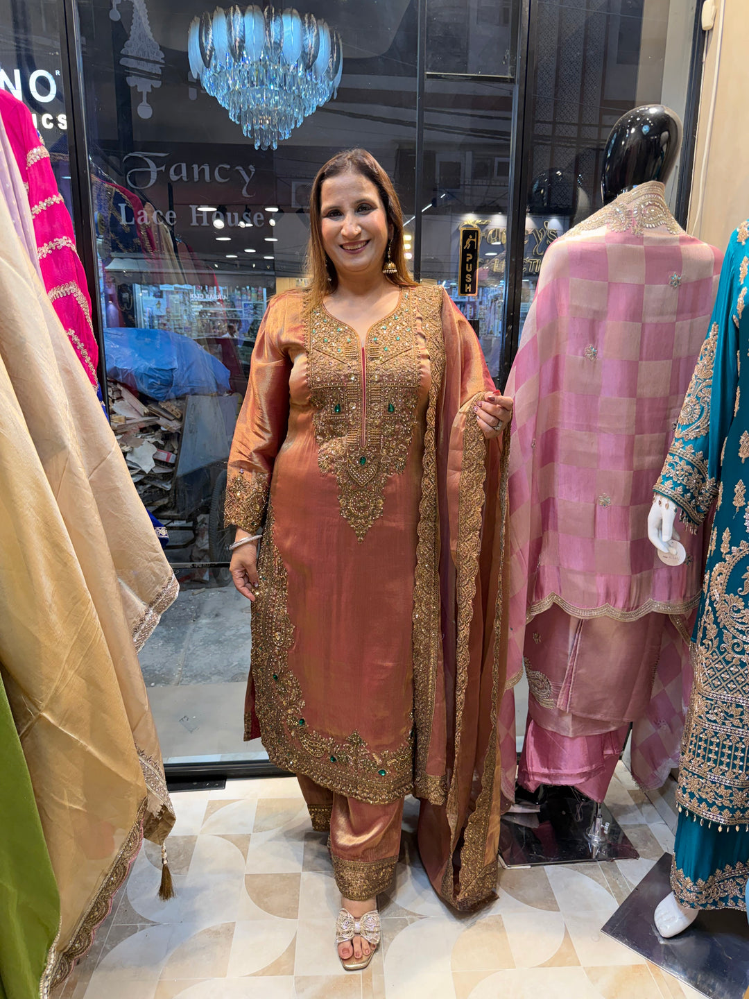 Meher –  Antique Peach Tissue Metallic Zari &amp; Emerald Embellished Set