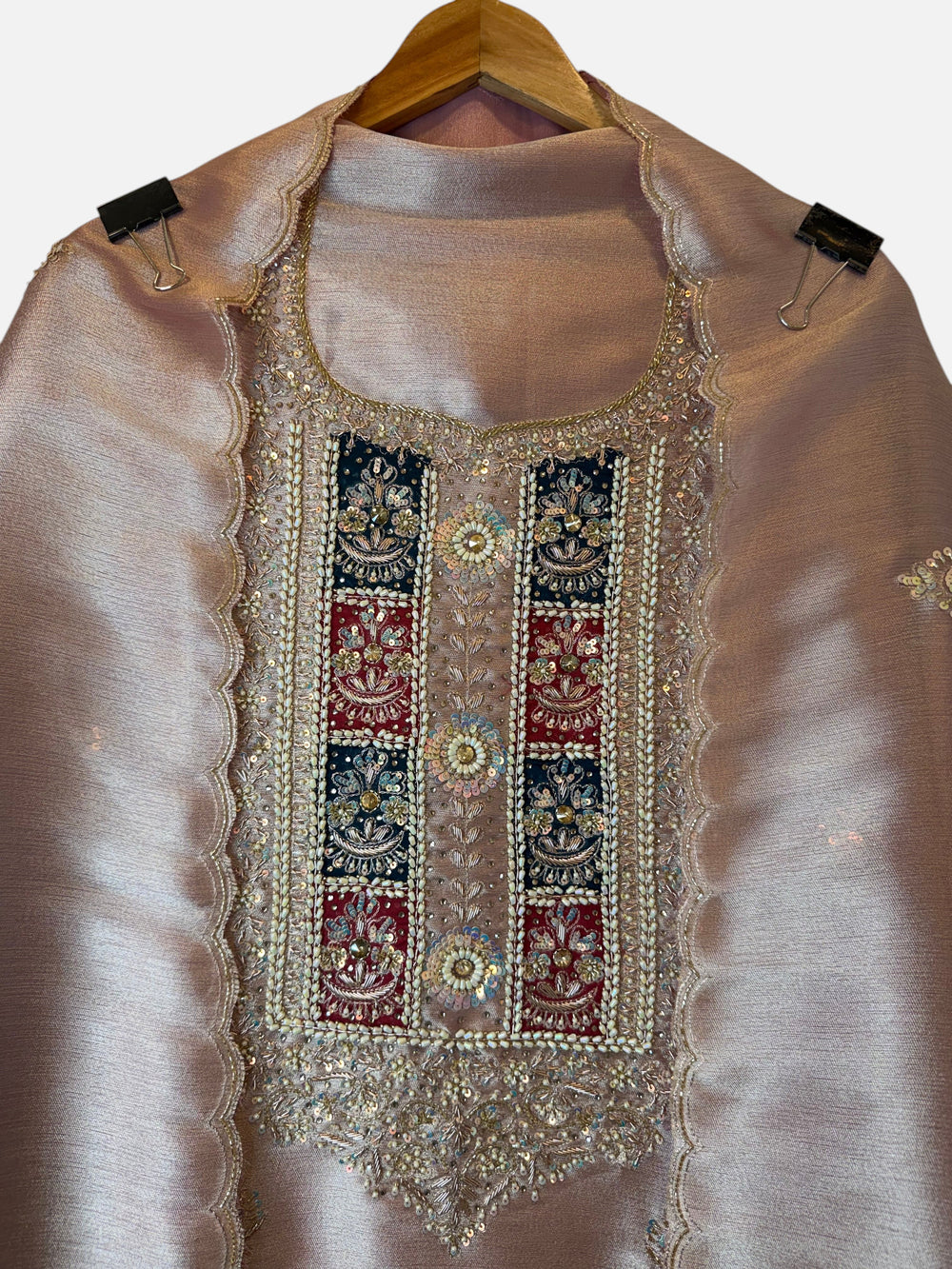 Design by Pakiza Zarmina ensemble featuring a pink giraffe tissue shirt with intricate pearl, sequin, and dabka work.