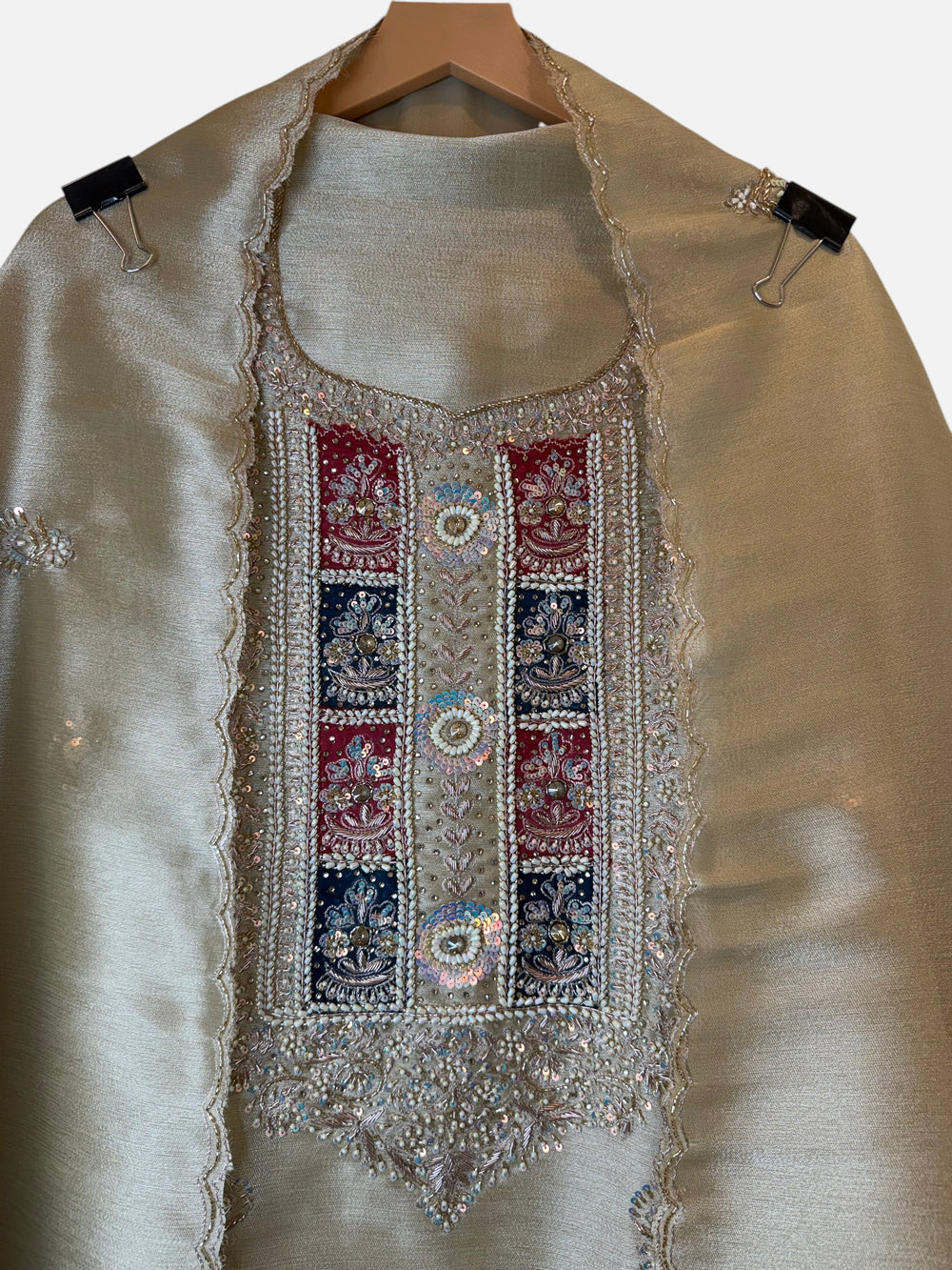 Design by Pakiza unstitched ensemble in giraffe tissue with intricate pearl, sequin, and dabka hand-embroidered neckline