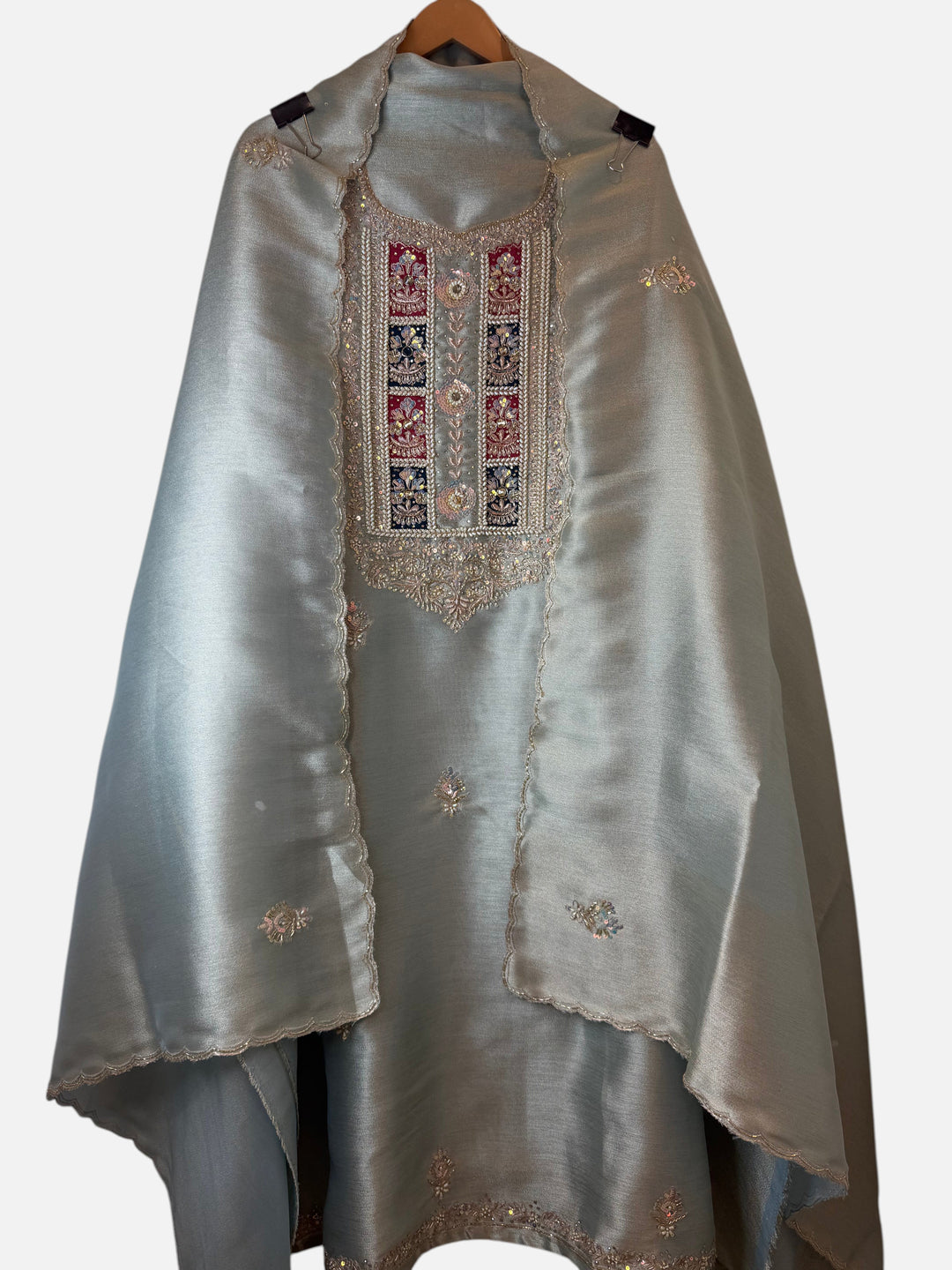 Design by Pakiza unstitched 3-piece ensemble in sage green giraffe tissue with intricate pearl and dabka handwork.