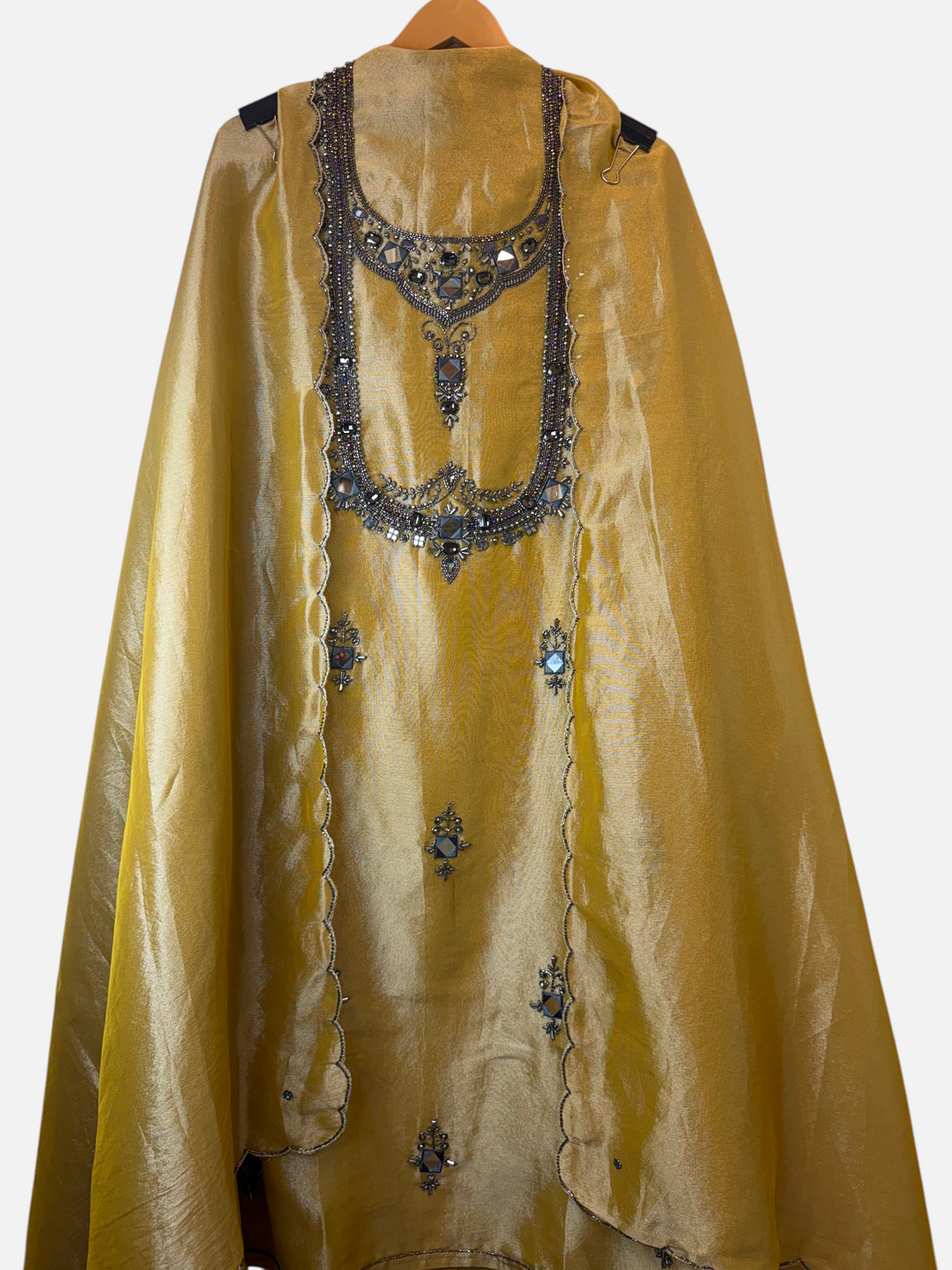 Design by Pakiza golden Kanjivaram unstitched shirt with intricate dori, sequin, and stone embellishments