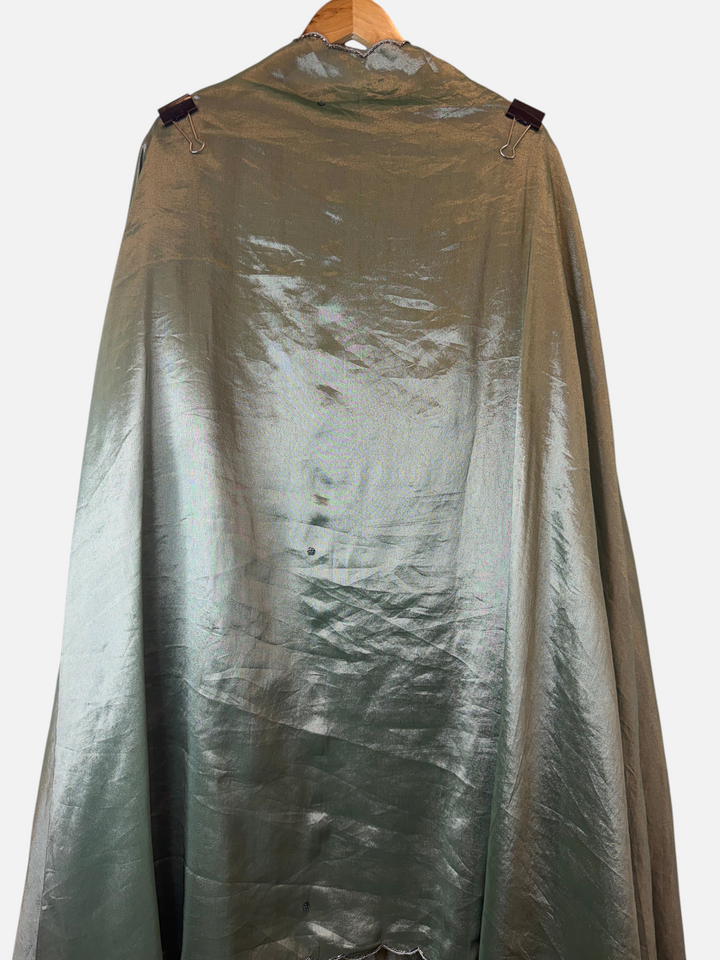 Design by Pakiza unstitched Kanjivaram silk fabric in a shimmering sage green tone for a traditional ensemble