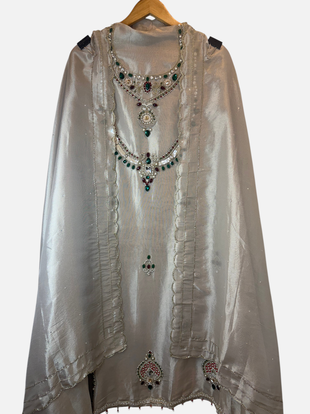 Design by Pakiza Zarqa tissue giraffe suit with heavy cutdana, pearl, and stone embellished neckline and dupatta