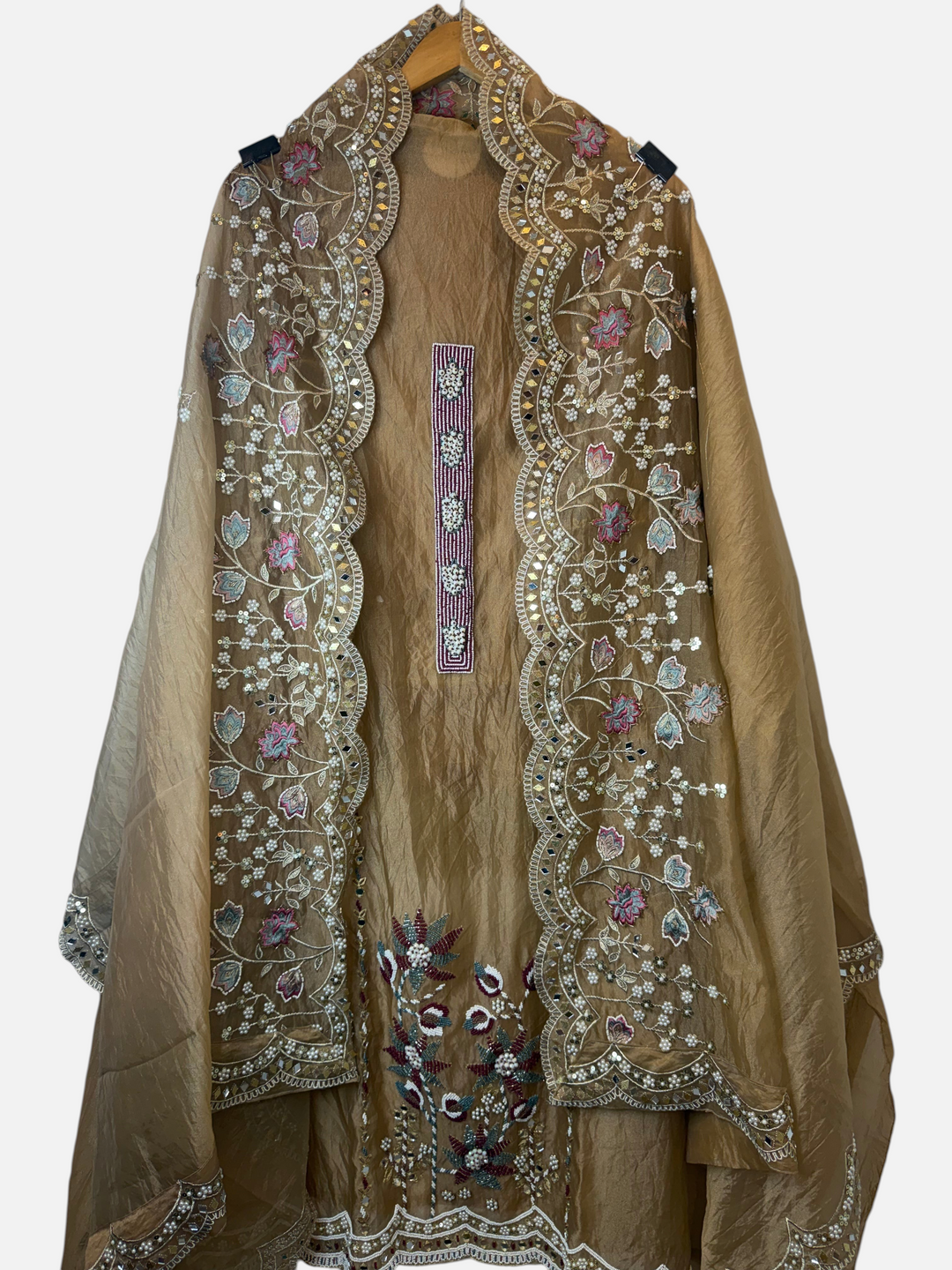 Design by Pakiza yellow crush tissue 3-piece ensemble with intricate mirror, pearl, and zari handwork embroidery.