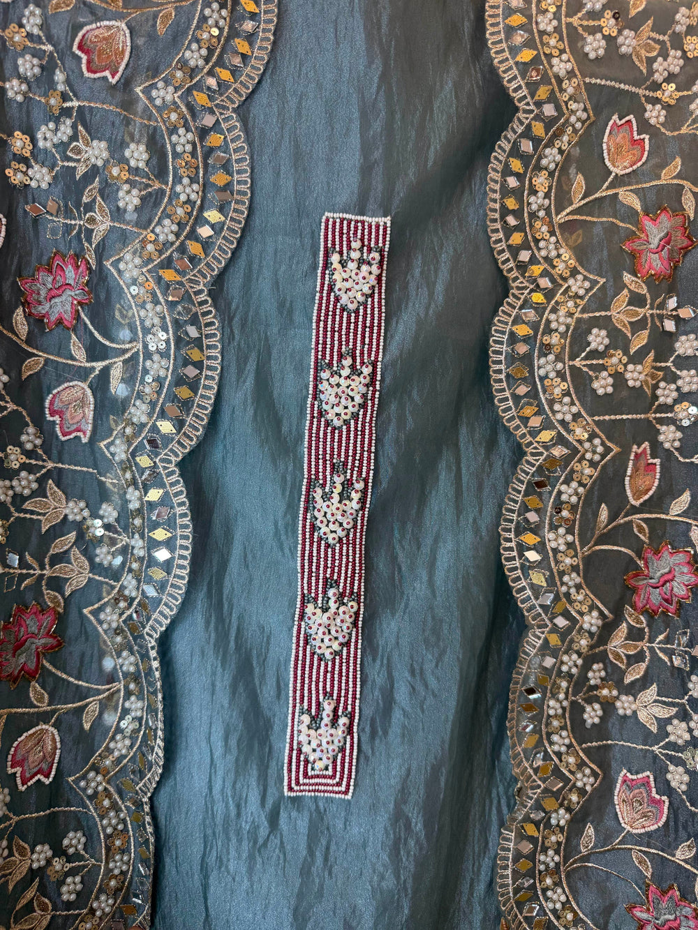 Design by Pakiza maroon and white beaded trim with intricate floral mirror work and pearl embellishments
