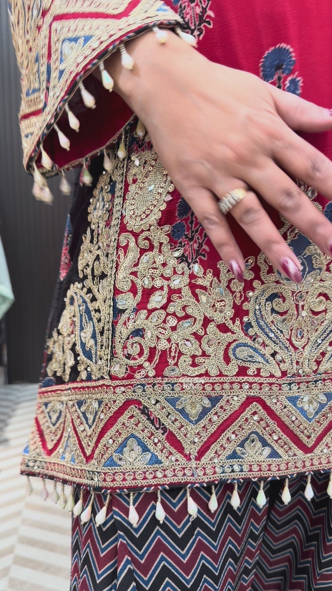 Noorika – Maroon Chinon Ajrak Printed Dori Work Suit